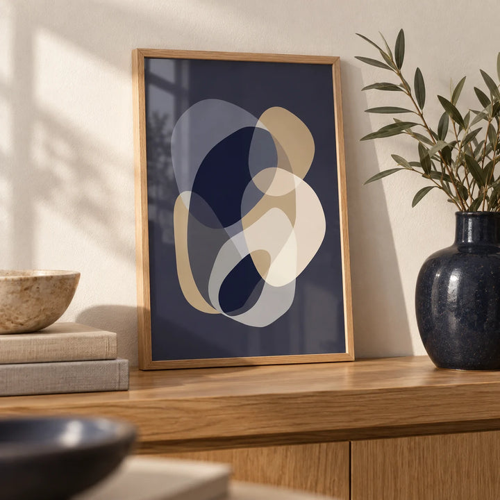 Prints Abstract Art, a small A4 framed print leaning on an oak shelf in a living room