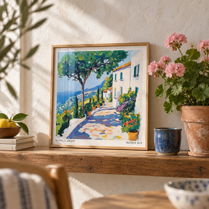 Prints of Amalfi Coast, a small A4 framed print leaning on a wooden shelf in a living room