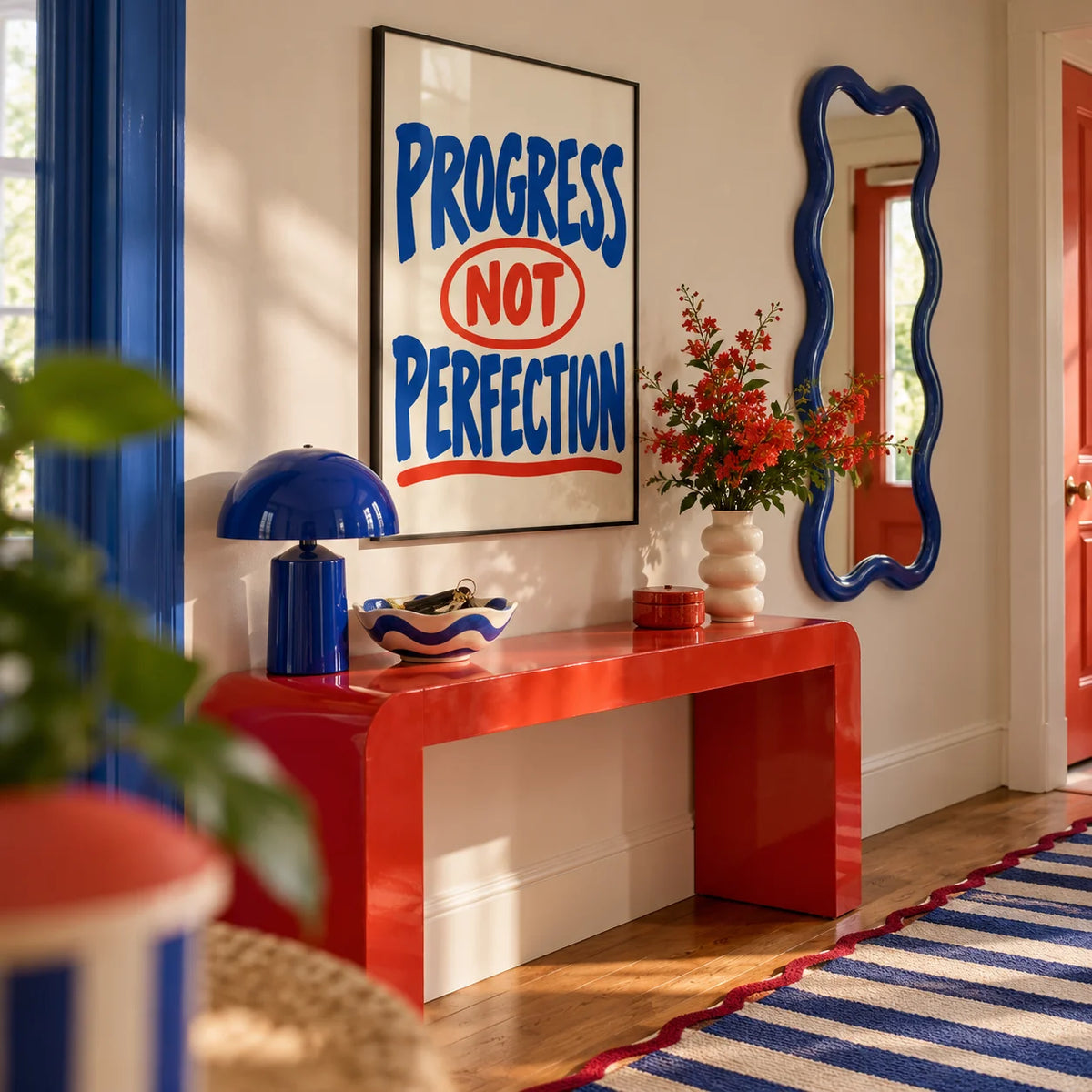 Progress Not Perfection Print, framed on the wall of a fun colourful hallway