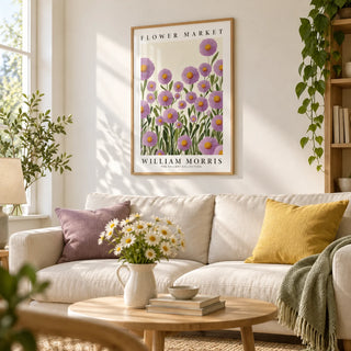Purple Floral Wall Art, framed on the wall of a bright living room with a white wall and a light oak floor