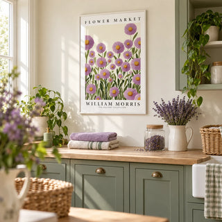 Purple Floral Wall Art, framed on the wall of a cheerful utility room with sage green cabinets and a cream wall in a laundry room