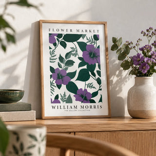 Purple Flower Artwork, a small A4 framed print leaning on an oak shelf in a living room