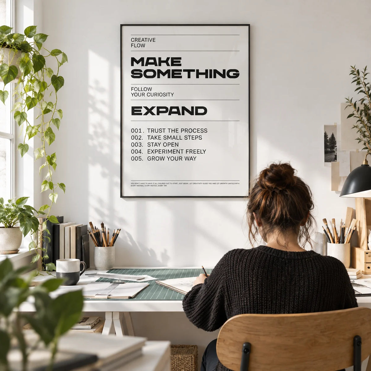 Quotes for Room Wall, framed on the wall of a bright craft studio in a spare room with a white wall in a home office