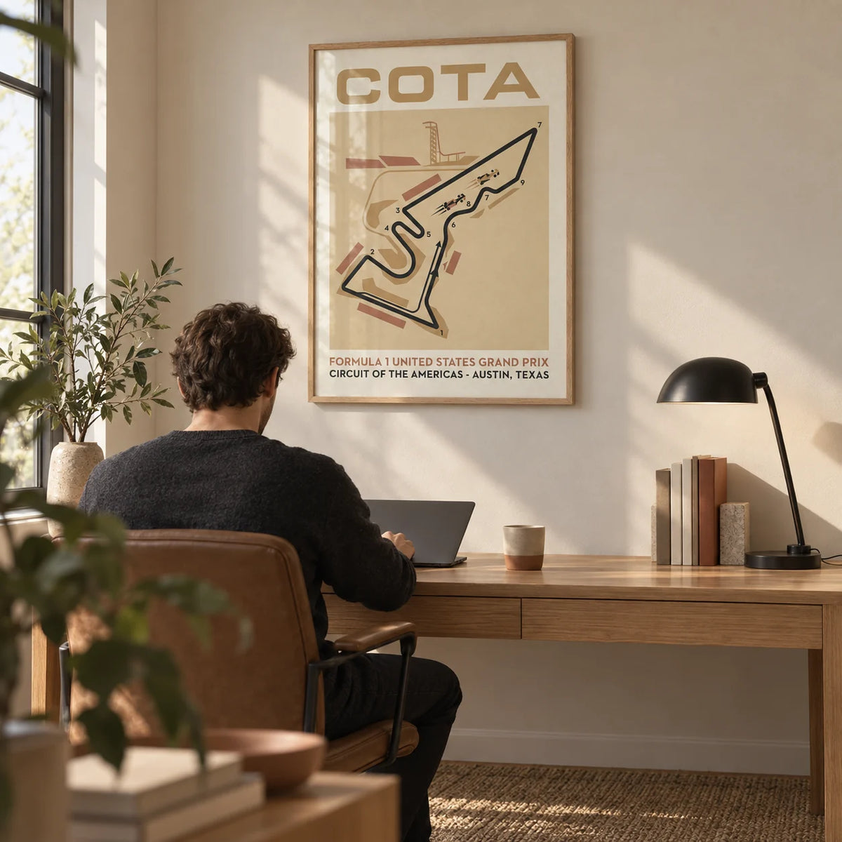 Race Track Map Poster, framed on the wall of a calm home office with a sand beige wall