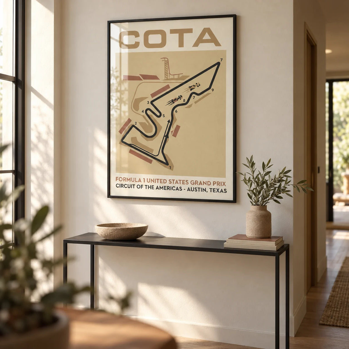 Race Track Map Poster, framed on the wall of a modern hallway with a warm white wall