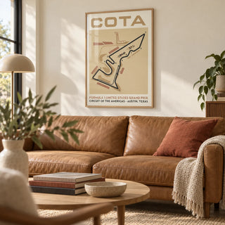 Race Track Map Poster, framed on the wall of a warm modern living room with a cream wall