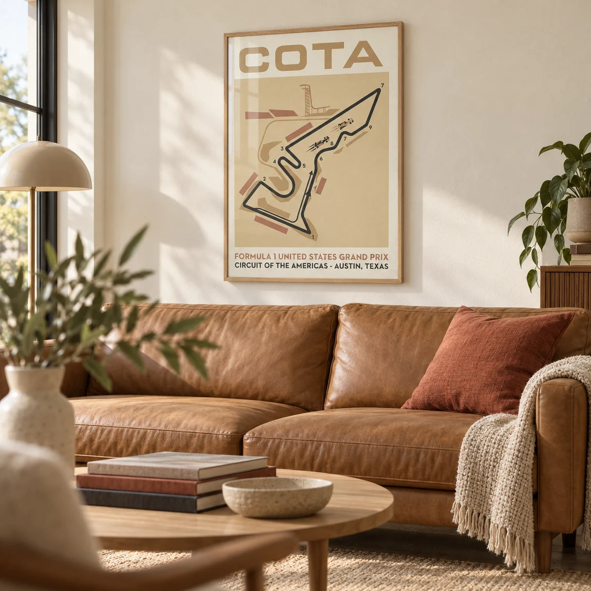 Race Track Map Poster, framed on the wall of a warm modern living room with a cream wall