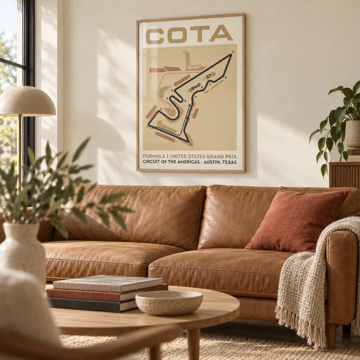 Race Track Map Poster, framed on the wall of a warm modern living room with a cream wall