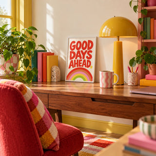 Rainbow Print, a small A4 framed print leaning on a desk