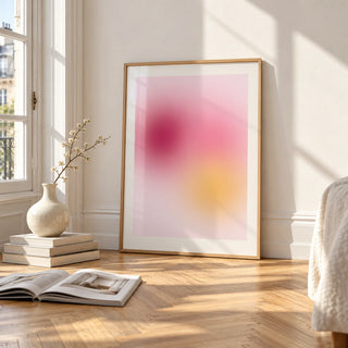 Raspberry Print, framed and leaning on the parquet floor of a bright living room