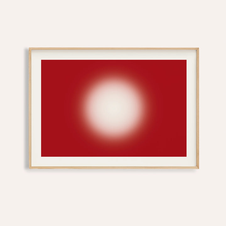 Red abstract wall art with a glowing cream orb on a deep cherry red ground