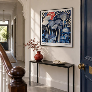 Red and Blue Art, framed on the wall of a bright entrance hallway in a Victorian terrace updated with modern joinery