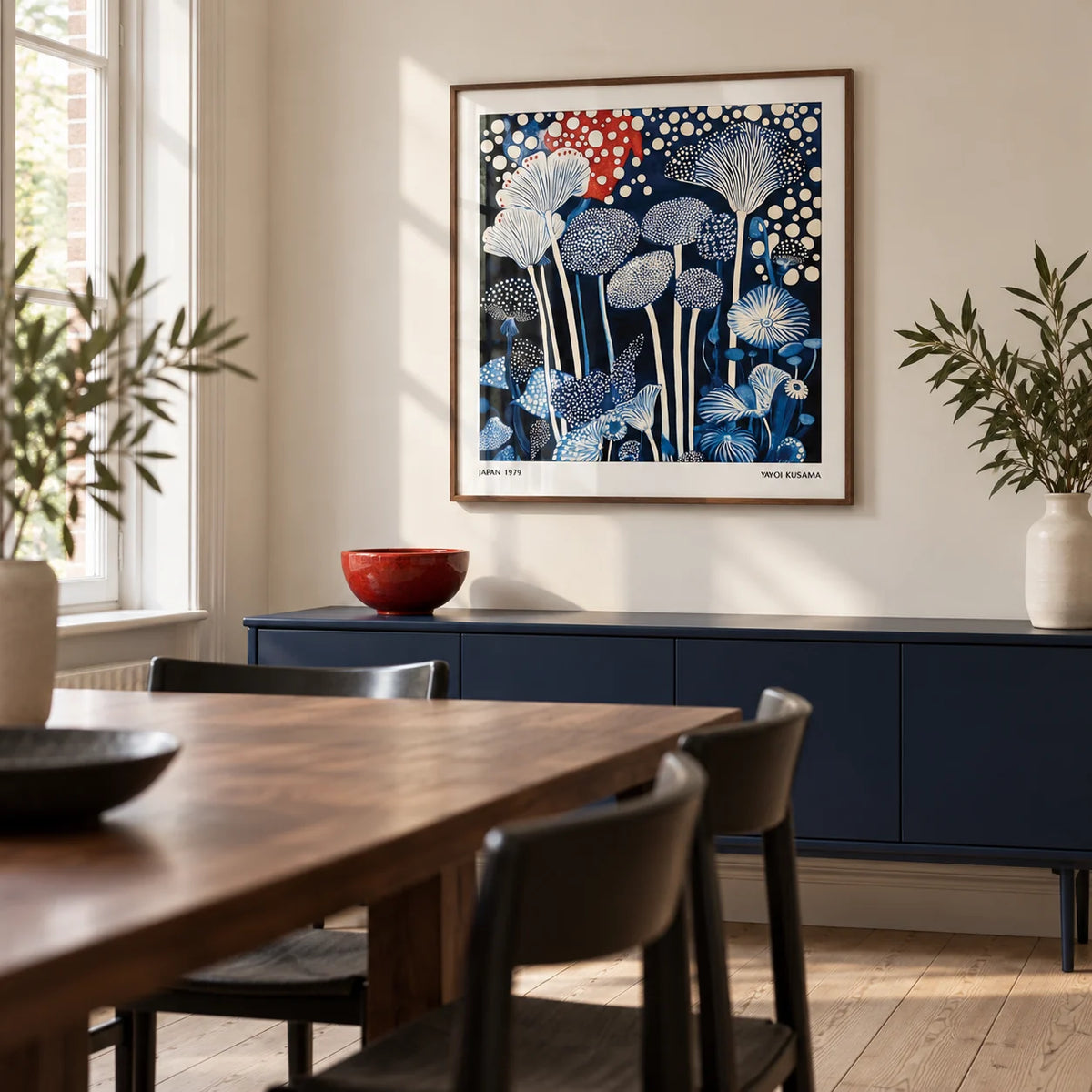 Red and Blue Art, framed on the wall of a crisp dining room in a renovated British terrace with a cream wall and pale timber flooring