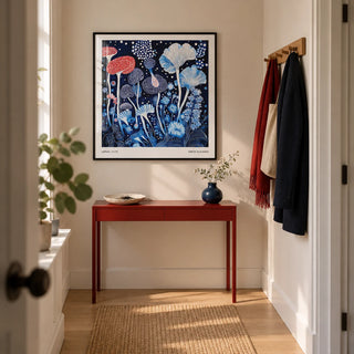 Red and Blue Wall Art, framed on the wall of a narrow entrance hallway in a modern UK flat with warm white walls and a pale oak floor