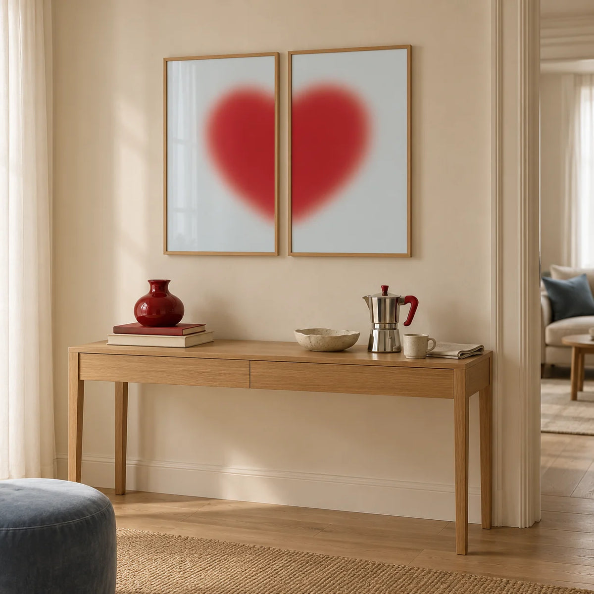 Red heart print set of 2 hung above an oak console in a hallway