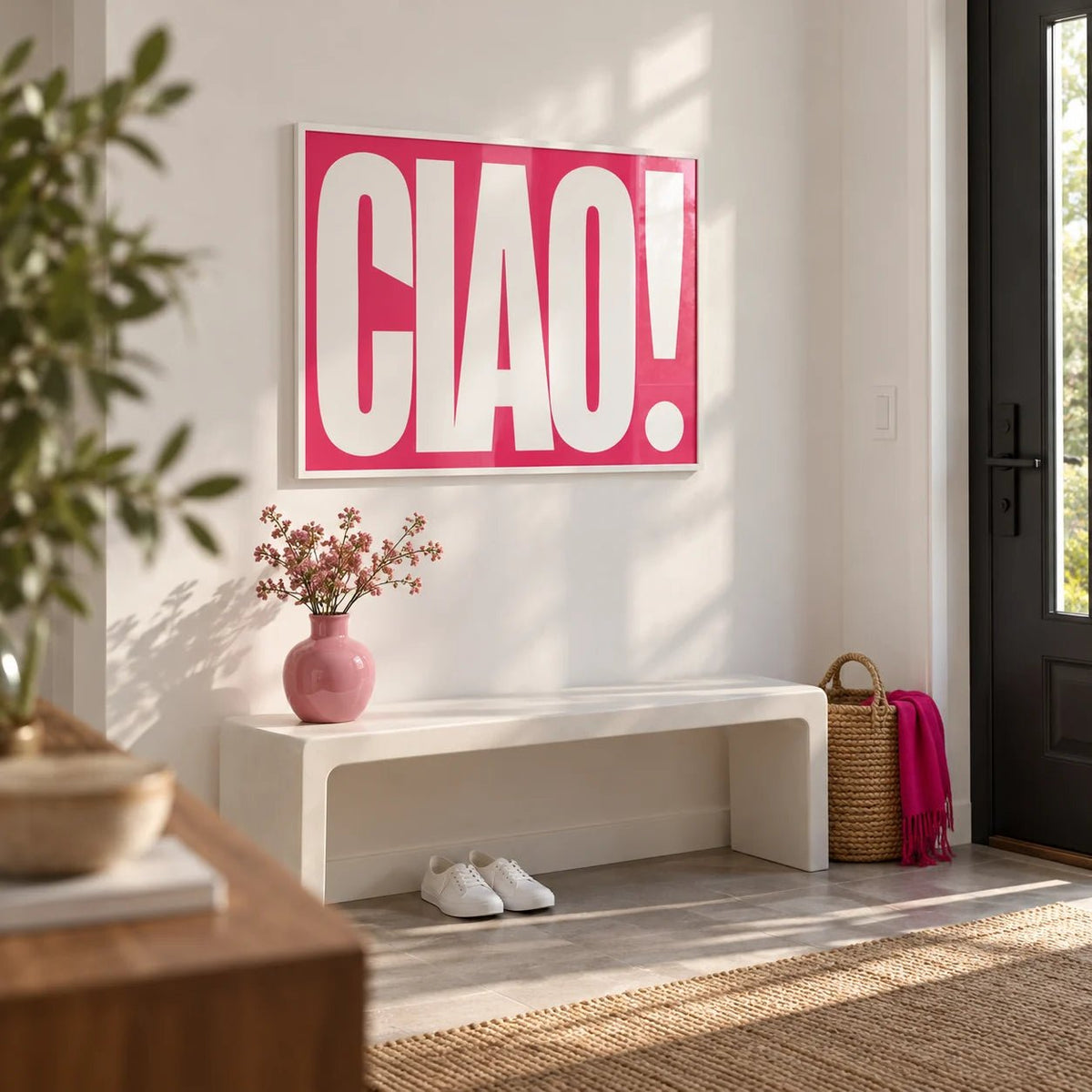 Red Text Print, framed on the wall of a modern entrance hall by the front door with a white wall