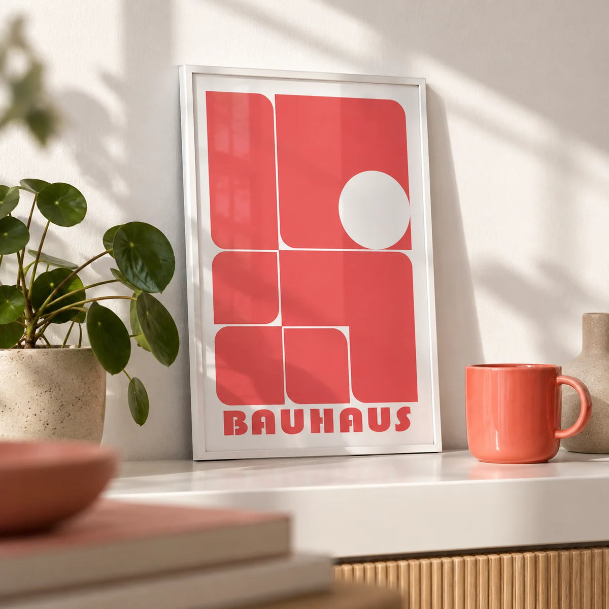 Red Wall Art Decor, a small A4 framed print leaning on a white shelf in a living room