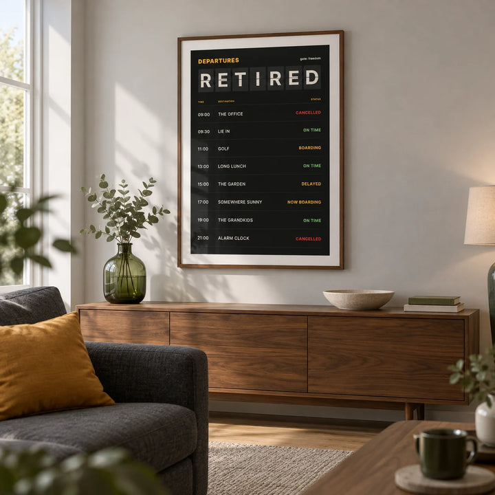 Retired Poster, framed on the wall of a crisp contemporary living room in a UK bungalow with a pale grey wall