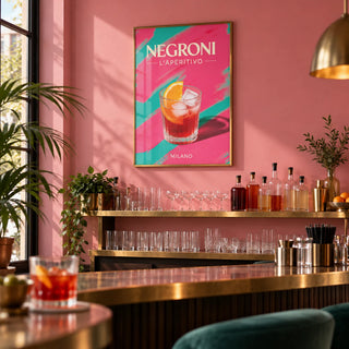 Retro Cocktail Art, framed on the wall of a small modern cocktail bar with a plain pink wall and a brass-edged counter in a kitchen