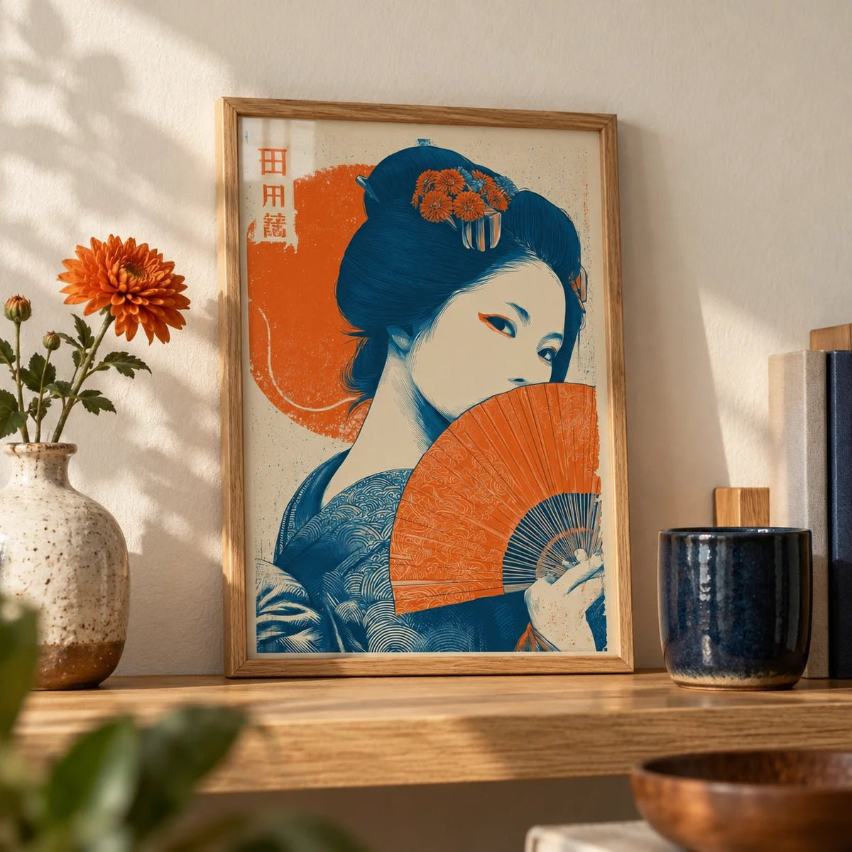 Geisha Print, a small A4 framed print leaning on an oak shelf in a living room