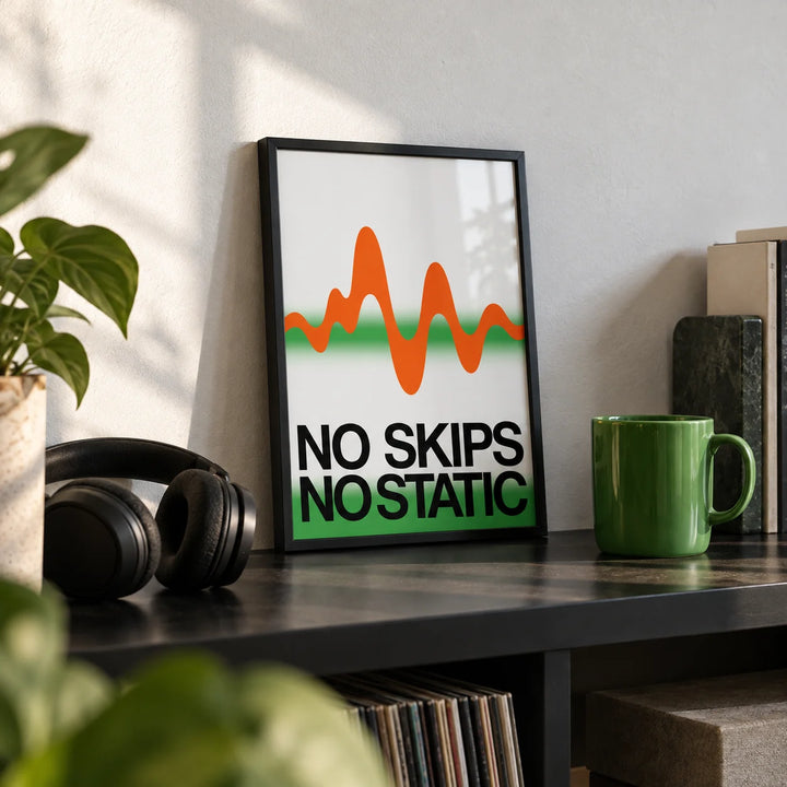Retro Music Poster, a small A4 framed print leaning on a black shelf in a living room