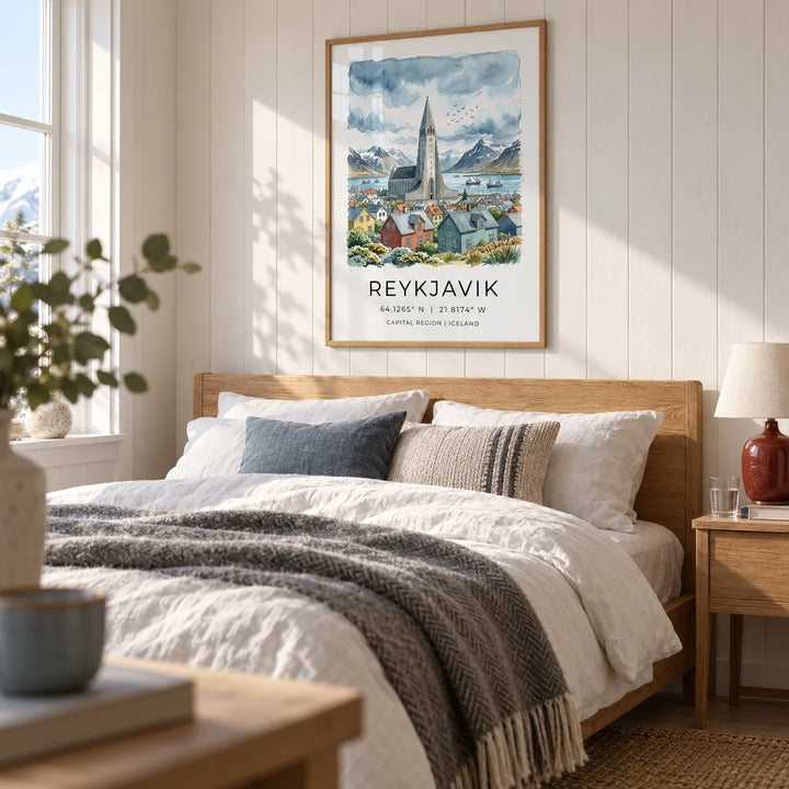 Reykjavik Watercolor Art Print, framed on the wall of a cosy Nordic bedroom with white timber walls