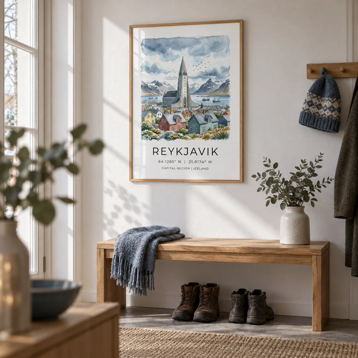 Reykjavik Watercolor Art Print, framed on the wall of a Scandinavian hallway with a white wall