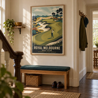 Royal Melbourne Golf Art, framed on the wall of a welcoming hallway in a British golfer's terraced house with warm cream plaster and dark wood floorboards
