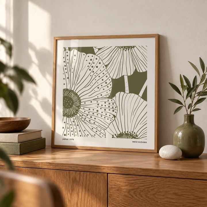 Sage Green Abstract Wall Art, a small A4 framed print leaning on an oak sideboard in a living room