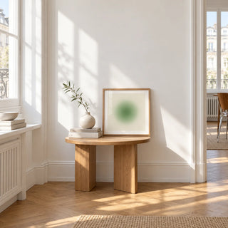 Sage Wall Art, a small square framed print leaning on a small solid oak side table