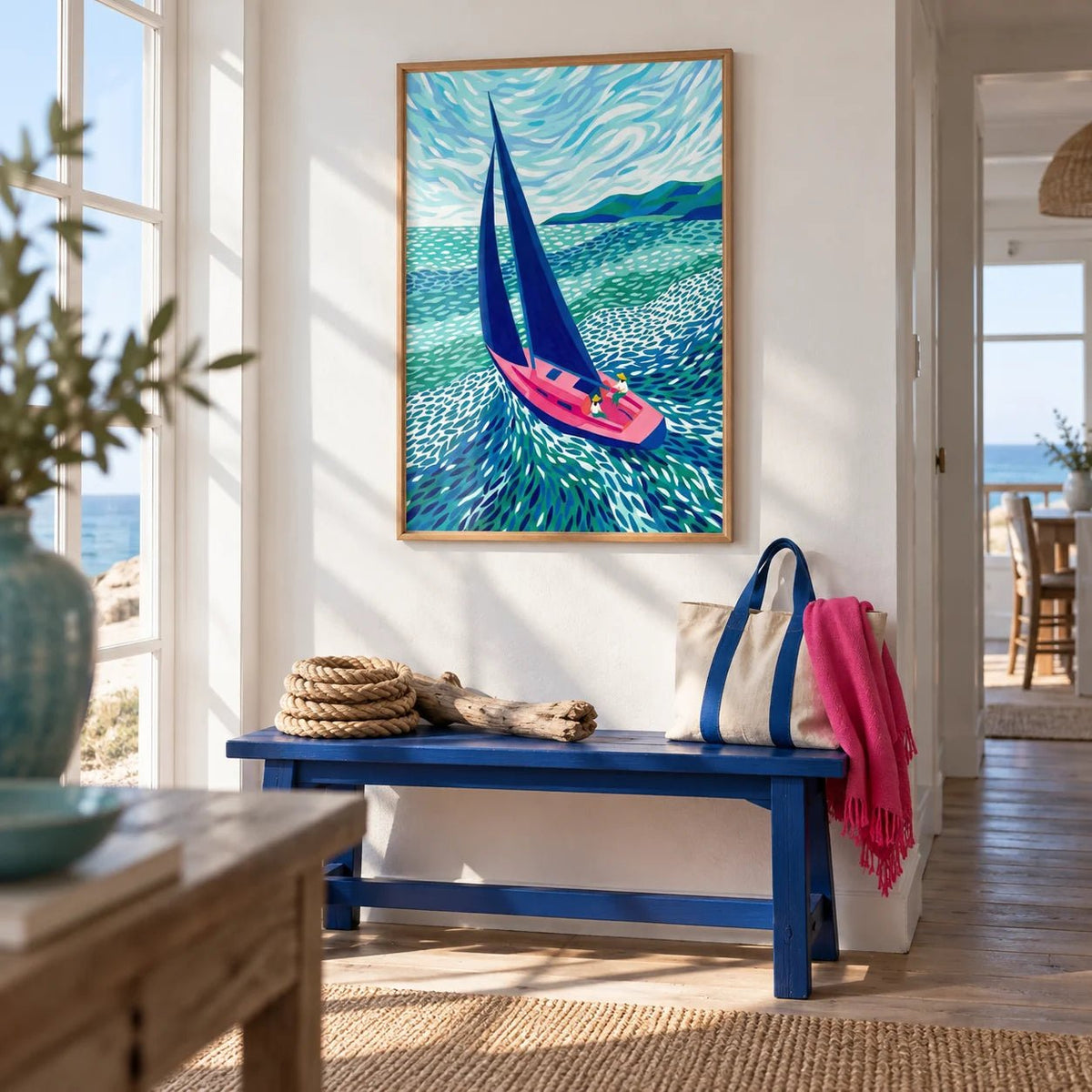 Sailboat Art Print, framed on the wall of a seaside cottage hallway