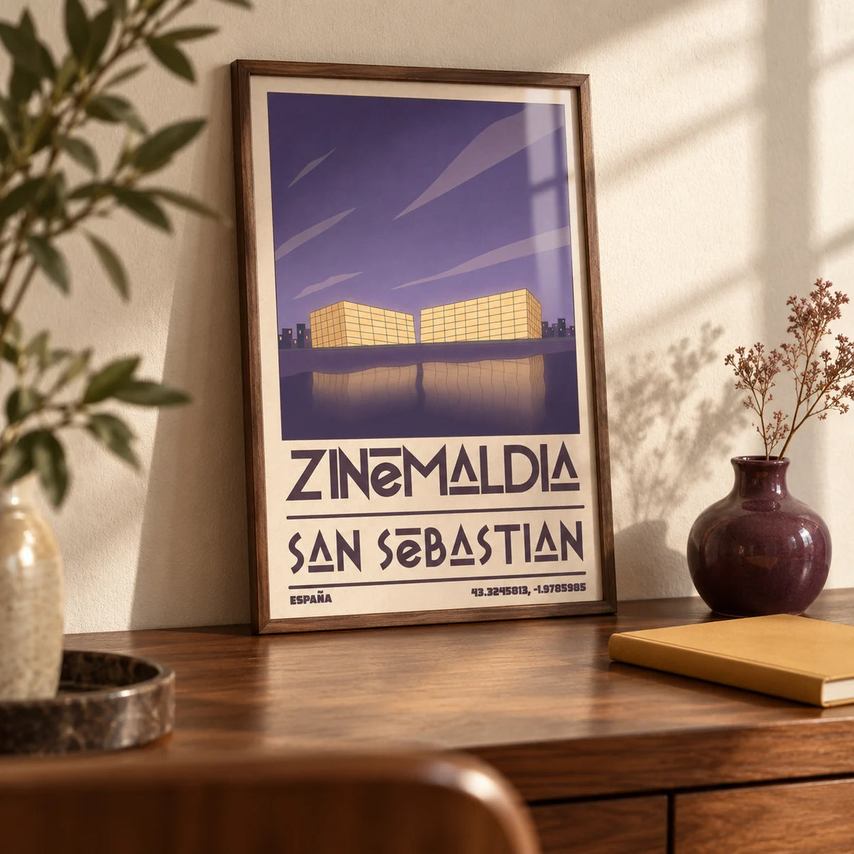 San Sebastian Wall Art, a small A4 framed print leaning on a walnut writing desk