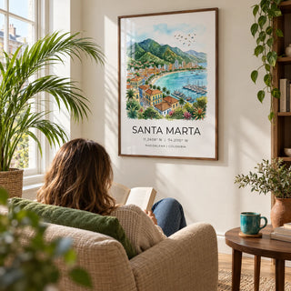 Santa Marta Art Print, framed on the wall of a sunny reading corner in a UK flat with an ivory wall and a tall window in a living room