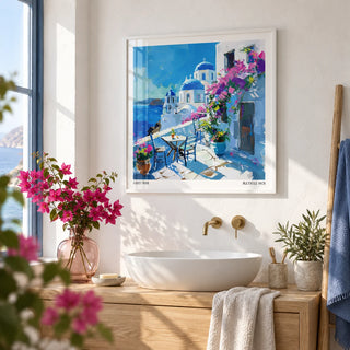 Santorini Wall Art Prints, framed on the wall of a bright white bathroom with smooth plaster walls