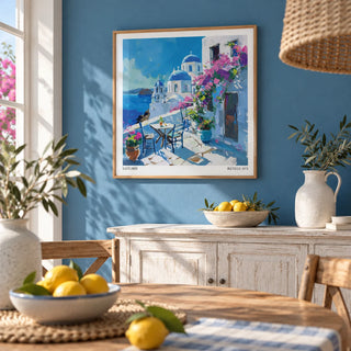 Santorini Wall Art Prints, framed on the wall of a sunny dining room with an aegean blue painted wall
