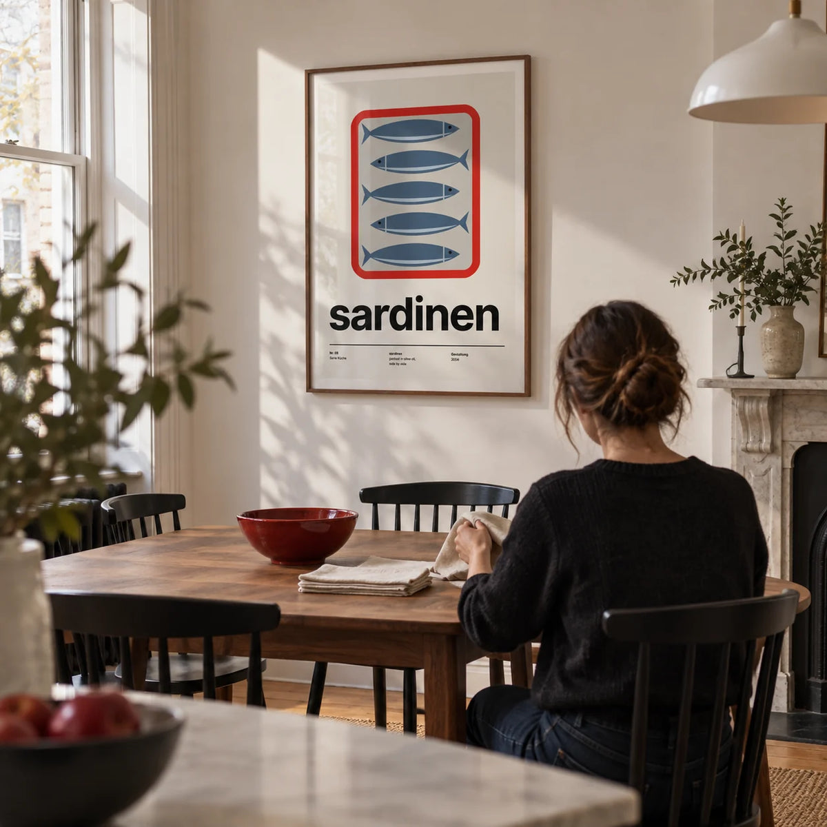 Sardine Print, framed on the wall of a contemporary dining room in a Victorian terrace with warm white walls and oak floorboards