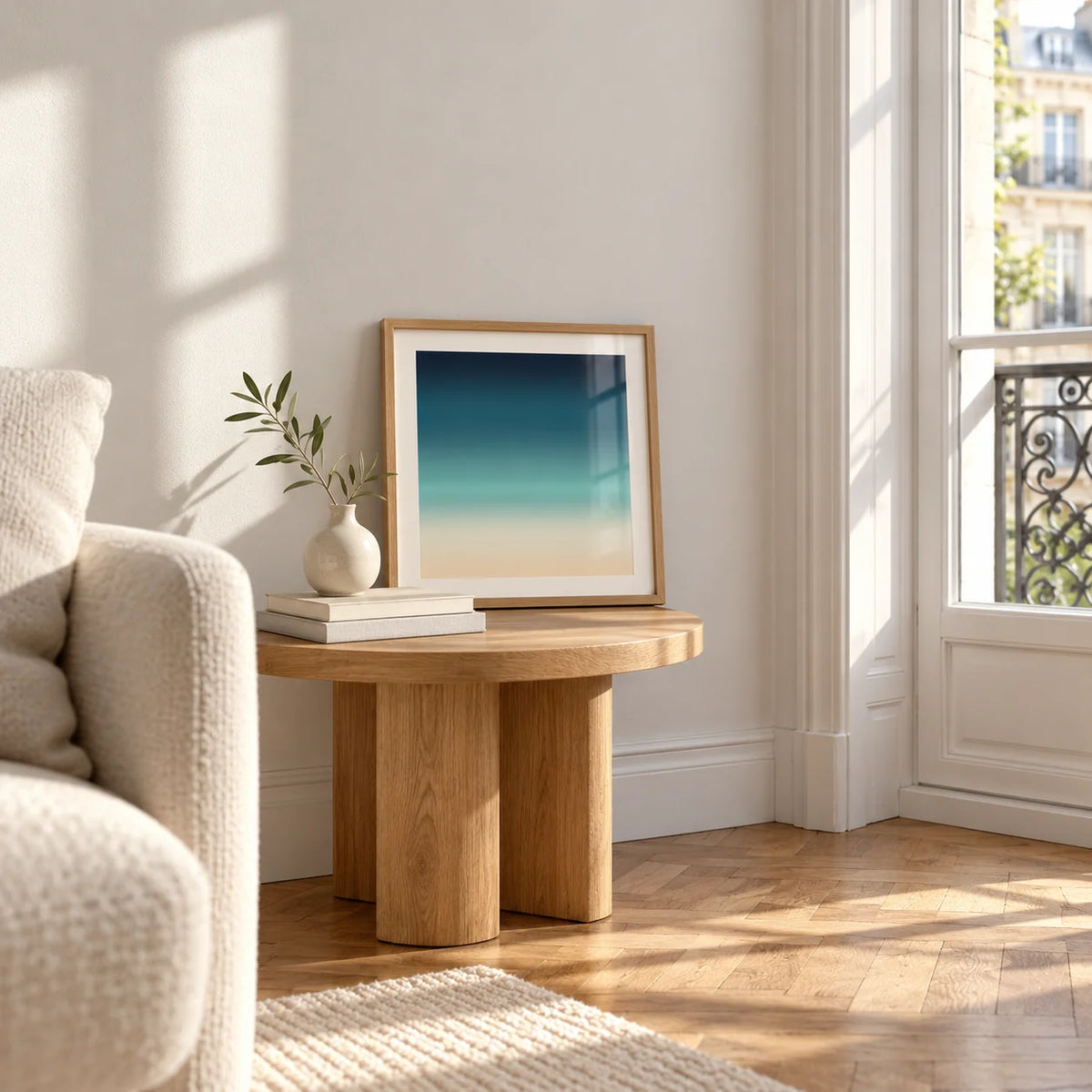 Sea Print, a small square framed print leaning on a small solid oak side table