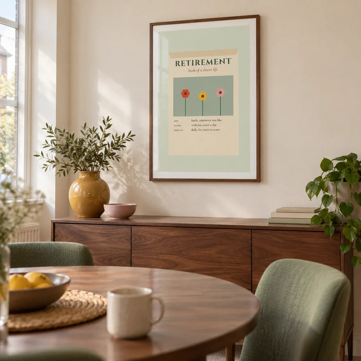 Seed Packet Poster, framed on the wall of a modest modern dining room in a UK terraced house with cream walls and a round walnut dining table