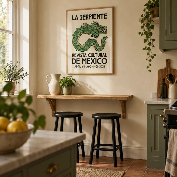 Serpent Cultural Art Print, framed on the wall of a compact characterful kitchen in a UK Victorian terrace with muted green cabinets