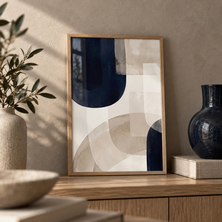 Shapes Minimalist Print, a small A4 framed print leaning on an oak shelf in a living room