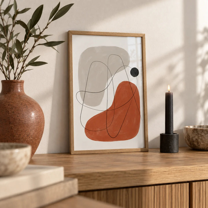 Simple Abstract Art, a small A4 framed print leaning on an oak shelf in a living room