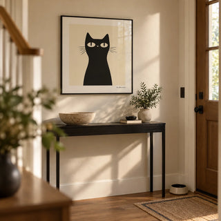 Simple Black Cat Art, framed on the wall of a calm hallway