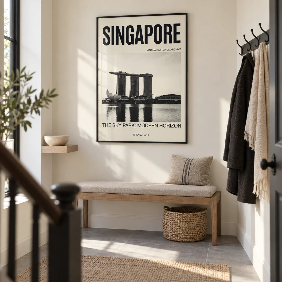 Singapore Modern Architecture Art Print, framed on the wall of a bright entrance hallway in a renovated UK maisonette with a warm white wall and large plain grey floor tiles
