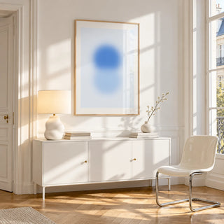 Sky Blue Print, framed on the wall of a bright Paris style apartment in a living room
