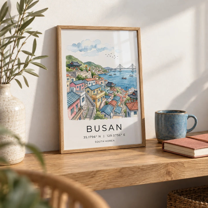 South Korea Art Print, a small A4 framed print leaning on an oak shelf in a living room