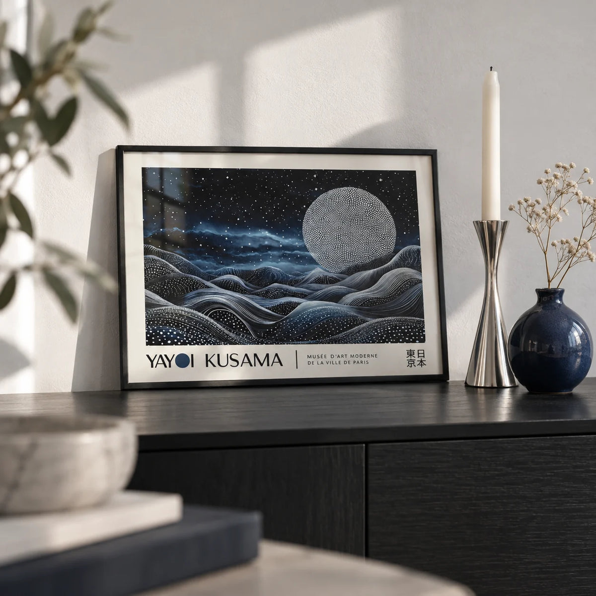 Space Art Wall, a small A4 framed print leaning on a black sideboard in a living room