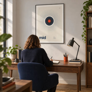 Speaker Poster, framed on the wall of a graphic designer's home study with a pale grey wall and simple oak floor