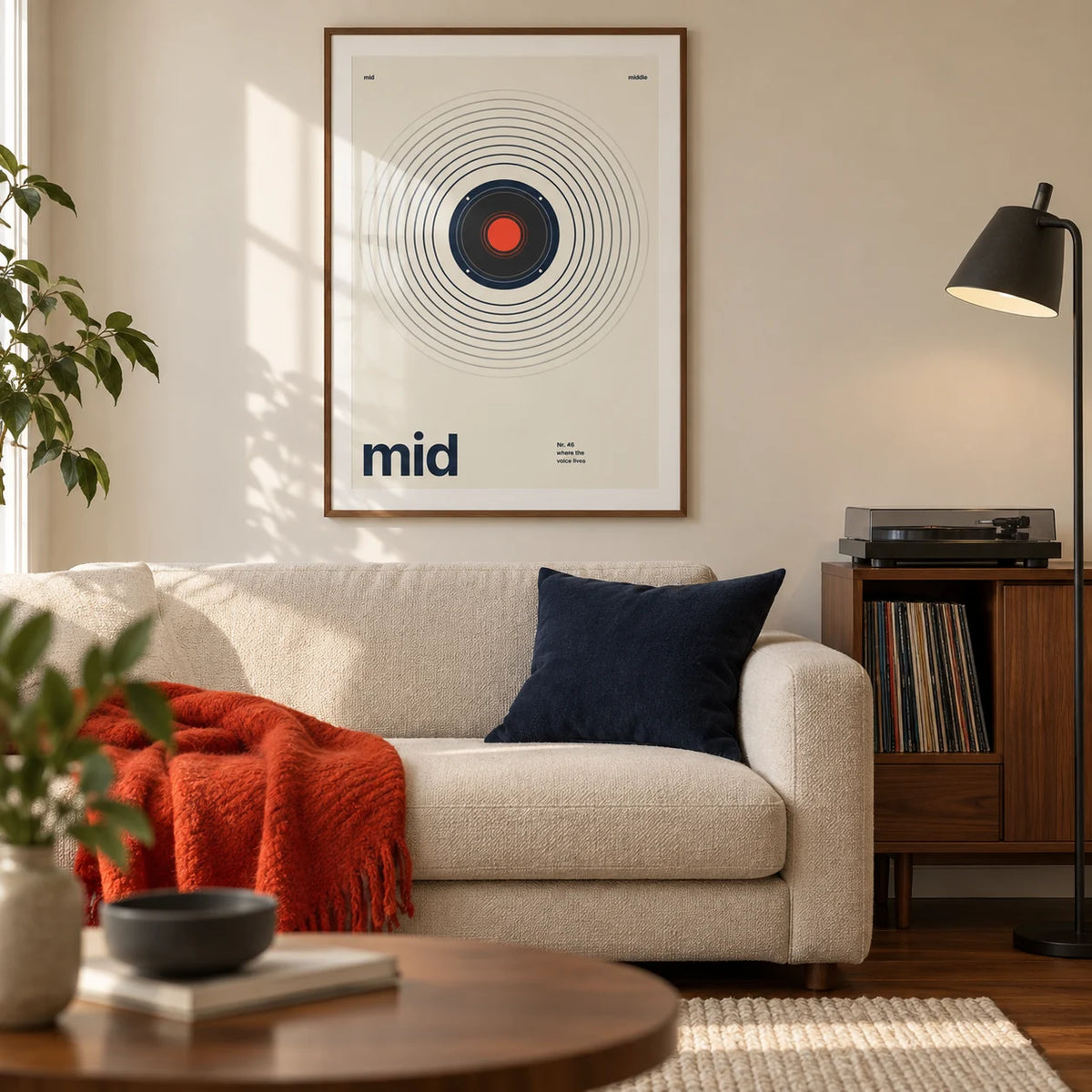 Speaker Poster, framed on the wall of a modern living room in a UK city flat with warm white walls and walnut flooring