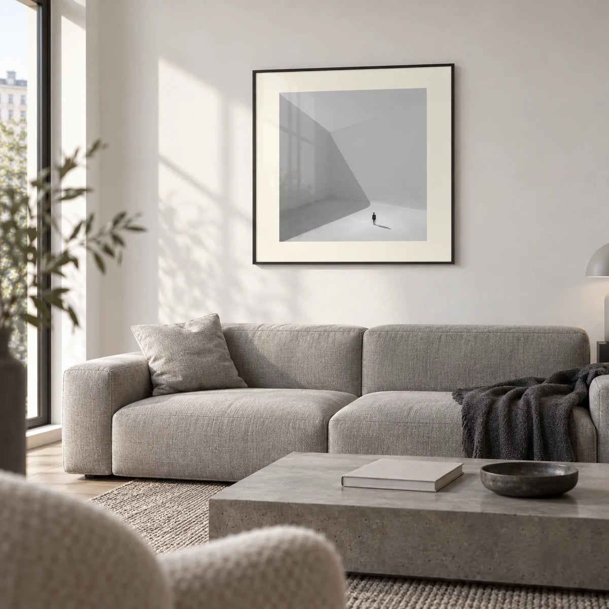 Square Art Prints, framed on the wall of a minimal city apartment living room