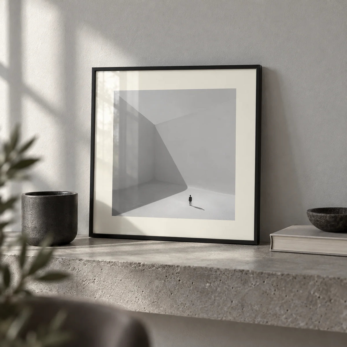 Square Art Prints, a small A4 framed print leaning on a concrete shelf in a living room
